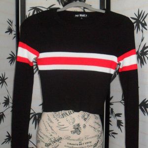 Black sweater with red and white stripe